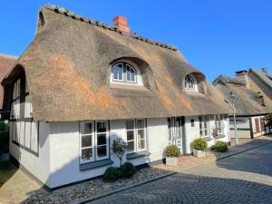 Casa con techo de paja en Fischerkate in Massholm, en Maasholm