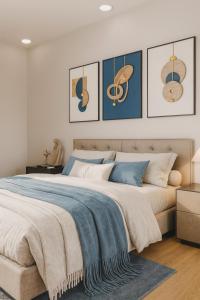 Postel nebo postele na pokoji v ubytování The Urban Quarter