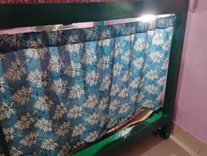 Giường trong phòng chung tại Global Beds Kolkata
