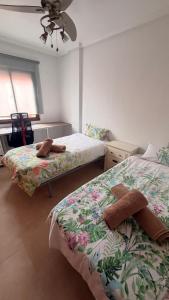 Una cama o camas en una habitación de Apartament ELITE