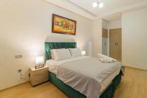 Ένα ή περισσότερα κρεβάτια σε δωμάτιο στο Beautiful apartment with pool view +23 φωτογραφίες