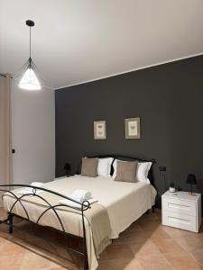 Ένα ή περισσότερα κρεβάτια σε δωμάτιο στο AntAle - Bed&Breakfast +4 φωτογραφίες