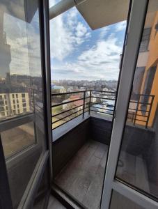 Balkón nebo terasa v ubytování Rise Світла квартира у новобудові біля Центру