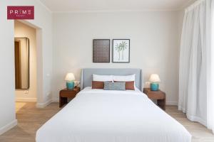 Ένα ή περισσότερα κρεβάτια σε δωμάτιο στο Prime Select Sodic Villette