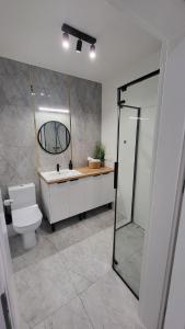 Koupelna v ubytování Apartament - Sienkiewicza 22D
