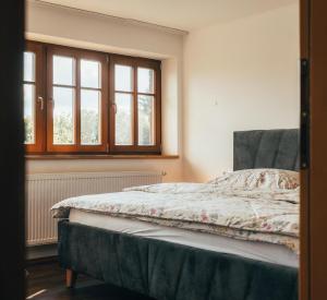 Ένα ή περισσότερα κρεβάτια σε δωμάτιο στο Samota 88 +14 φωτογραφίες