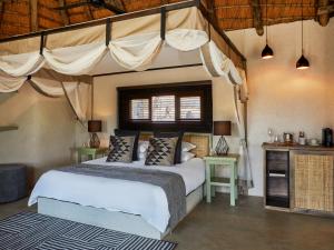 Postel nebo postele na pokoji v ubytování Toro River by Newmark