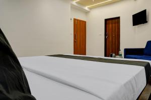 TV a/nebo společenská místnost v ubytování Super Hotel O KP Pride + 25 fotografií