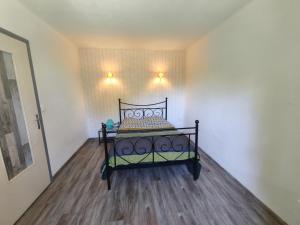 Ένα ή περισσότερα κρεβάτια σε δωμάτιο στο Maison 2 chambres 80m2
