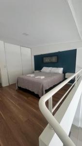 Ένα ή περισσότερα κρεβάτια σε δωμάτιο στο DrPropiedades 311