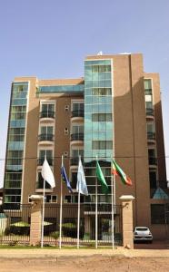 a building with flags in front of it at YOD Abyssinia International Hotel and Cultural Restaurant in Addis Ababa