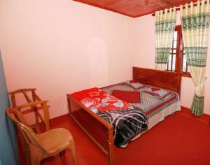Postel nebo postele na pokoji v ubytování Holiday Guest in Nuwara Eliya + 4 fotografie