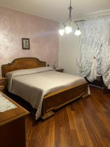 Ένα ή περισσότερα κρεβάτια σε δωμάτιο στο Villa Dina
