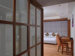 Fotografie z fotogalerie ubytování Regenta Place Ahmedabad v destinaci Ahmadábád + 15 fotografií