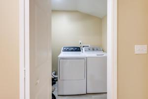 a white washer and dryer in a room at Less Than 10 Mi to UAB Birmingham Group Getaway in Fairfield