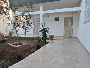 Κήπος έξω από το Résidence de la plage Ghar El Melh