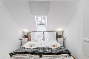 Ένα ή περισσότερα κρεβάτια σε δωμάτιο στο TOP Apartments - Modernes Appartement im Stadtzentrum - Klima - Netflix