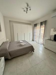 Una cama o camas en una habitación de Suite Gelsomino