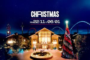 a christmas tree in front of a large building at PortAventura Hotel Gold River - Includes unlimited access to PortAventura Park & 1 access to Ferrari Land in Salou +51 photos
