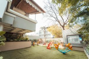 Κήπος έξω από το Mastiff Hotel Chinchwad by OTHPL