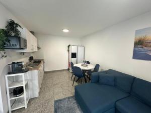 Kuchyň nebo kuchyňský kout v ubytování Luxx Home Ulm-Jungingen, Modern, Küche, Parken