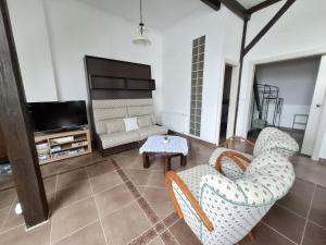 TV a/nebo společenská místnost v ubytování Apartmán Coralina