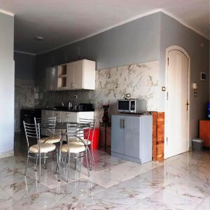 Kuchyň nebo kuchyňský kout v ubytování Jolie villa private pool