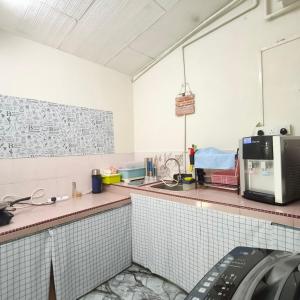 Η κουζίνα ή μικρή κουζίνα στο Ipoh Simee Guesthouse & Stadium & City Sights & Hospitals