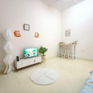 Μια τηλεόραση ή/και κέντρο ψυχαγωγίας στο Ipoh Simee Guesthouse & Stadium & City Sights & Hospitals