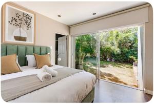 Ένα ή περισσότερα κρεβάτια σε δωμάτιο στο Wellness Guesthouse