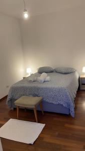 Ένα ή περισσότερα κρεβάτια σε δωμάτιο στο Rivellino Guesthouse