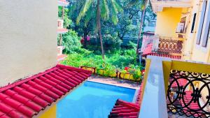 a view of a swimming pool from a building at 3bhk Villa calangute in Calangute