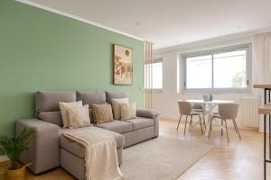 Posezení v ubytování Appartement charmant au coeur du 16eme