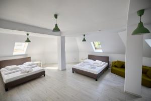 Giường trong phòng chung tại Mountain Apartments SuperSki