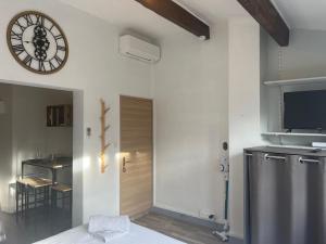 Kuchyň nebo kuchyňský kout v ubytování Prune - Studio climatisé 4e place pie