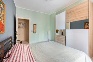 Ένα ή περισσότερα κρεβάτια σε δωμάτιο στο Appartamento tra Museo Ferrari, stazione e centro