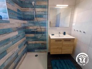 a bathroom with a shower and a sink at L'Escapade in Gagnac +15 photos