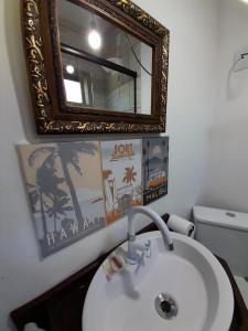 Koupelna v ubytování Bangalô Praia da Ferrugem + 13 fotografií