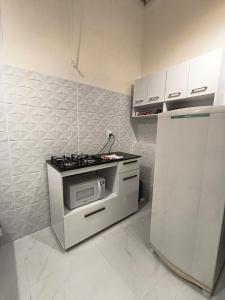 Η κουζίνα ή μικρή κουζίνα στο Centro, ap novo, coração de BH, conforto e acesso +27 φωτογραφίες