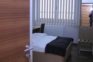 Postel nebo postele na pokoji v ubytování Rooms Virovitica