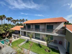 an aerial view of a house with a balcony at DECK DOS LENÇÓIS pousada in Barreirinhas
