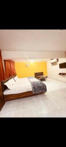 Ένα ή περισσότερα κρεβάτια σε δωμάτιο στο Hotel shree radhe palace