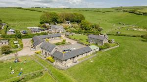 an aerial view of a large house in a field at 3 Bed in Whitwell oc-h33498 in Whitwell