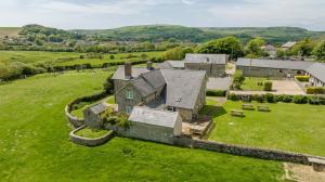 an aerial view of a large house in a field at 2 Bed in Whitwell oc-o33499 in Whitwell