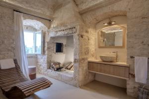 TV a/nebo společenská místnost v ubytování Masseria Saccente