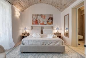 Postel nebo postele na pokoji v ubytování Masseria Saccente + 38 fotografií