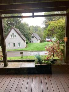 a view of a yard from the porch of a house at Sue's Lodge in Cawsand