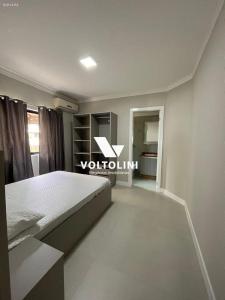 Ένα ή περισσότερα κρεβάτια σε δωμάτιο στο 02 APARTAMENTO TÉRREO BEIRA MAR - Apto 02