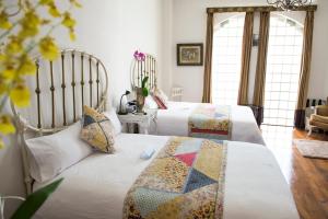 Postel nebo postele na pokoji v ubytování Hotel Don Alfonso