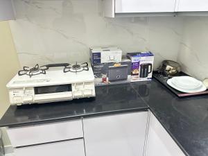 Η κουζίνα ή μικρή κουζίνα στο Tameer Lifestyles